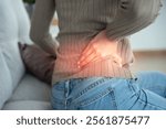 woman holding her lower back while and suffer from unbearable pain health and problems, chronic back pain, backache in office syndrome, scoliosis, herniated disc, muscle inflammation