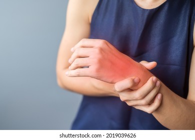 woman holding her wrist pain because using smartphone or computer long time. De Quervain's tenosynovitis, Intersection Symptom, Carpal Tunnel Syndrome or Office syndrome concept
