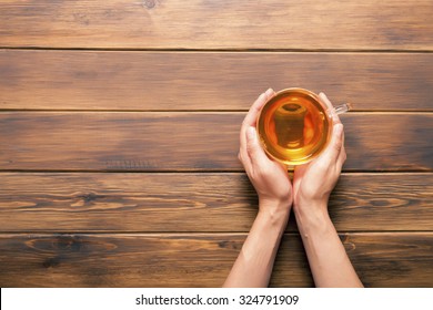 Woman Holding Hot Cup Of Tea