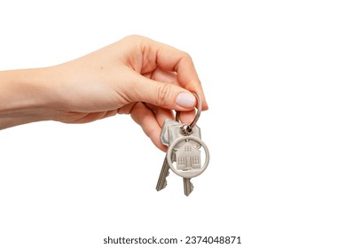 Woman holding house keys with house shaped keychain, isolated on white background - Powered by Shutterstock