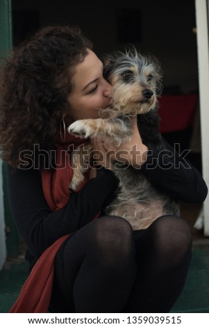 Similar – Portrait of a young, tall woman behind a blond Labrador