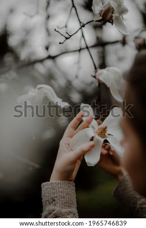 Similar – Image, Stock Photo Girl plucks off a piece of cotton candy