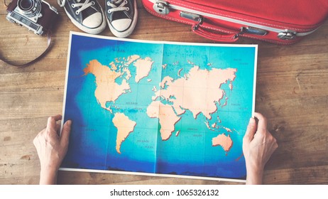 Woman Holding Map Travel Concepts