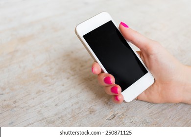 Woman Holding Mobile Phone