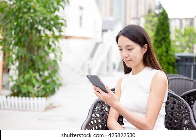 Woman Holding Mobile Phone