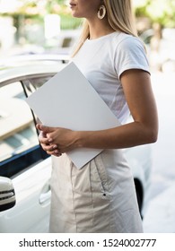 Woman Holding A Mock-up Magazine