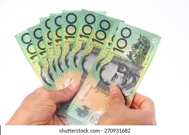 Woman Holding Money - AUD - Australian Dollars