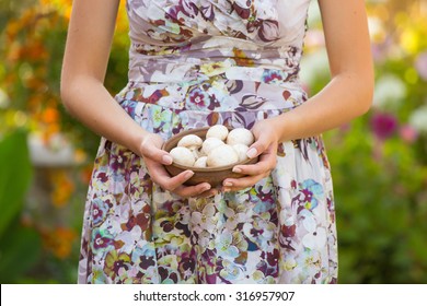 Woman Holding Mushroom. Concept - Simple Life.