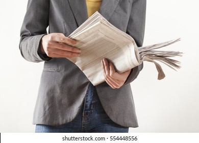 Woman Holding Newspaper On White Background