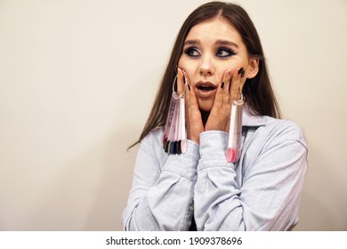 Woman Holding Palette Nails She Impressed Stock Photo 1909378696