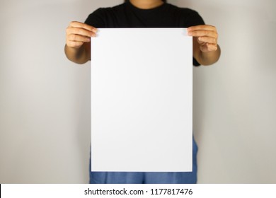 Holding A3 Paper Photos and Images