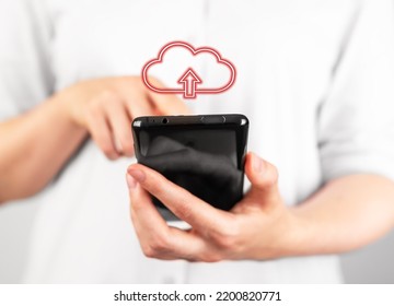 Woman Holding Phone For Illegal File Download. Online Piracy Concept. Unlicensed Software Programs, Unauthorized Application Using. Mobile Malware. High Quality Photo