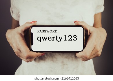 Woman Holding Phone With Weak Password Qwerty123. Cybersecurity Breach Risk, Privacy Protection Concept