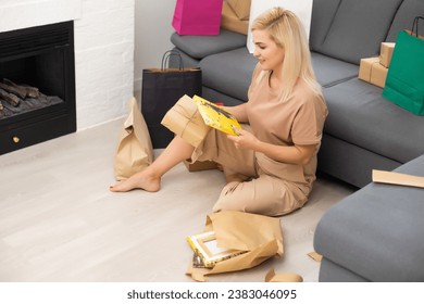 woman holding photocanvas. Holiday or special occasion gift concept. - Powered by Shutterstock