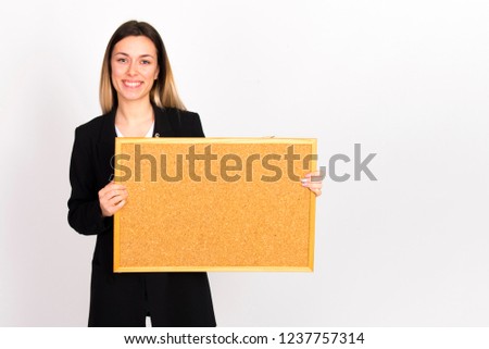 woman holding pin  board