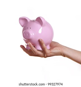 Woman Holding A Pink Piggy Bank.