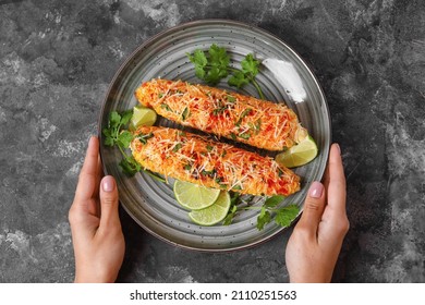 Woman Holding Plate With Tasty Elote Mexican Street Corn On Black Background