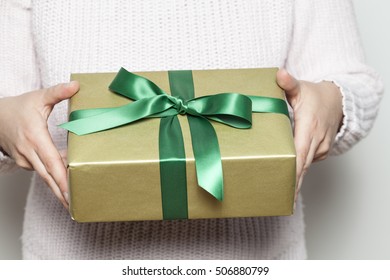 Woman Holding A Present