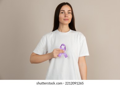 Woman Holding A Purple Ribbon In Her Hands ADD,ADHD,Alzheimer Disease ,Arnold Chiari Malformation,Childhood Hemiplegia Stroke, Epilepsy, Chronic Acute Pain,Crohns