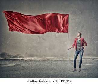 Woman Holding Red Flag