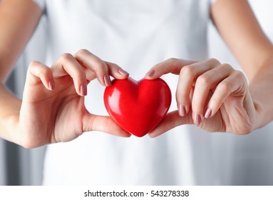 Woman Holding Red Heart In Hands, Closeup