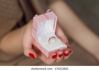 Woman Holding A Ring Box