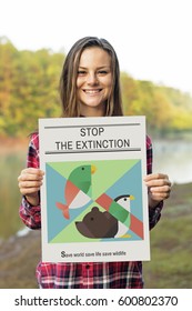 Woman Holding Save Animals Banner