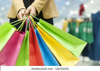 Woman Holding Shopping Bags