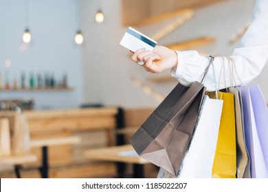 Woman Holding Shopping Bags And Credit Card