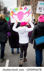 Woman Holding Sign 