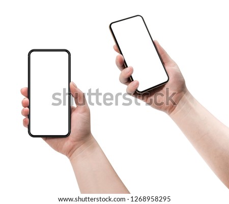 Woman holding smartphone with blank screen. 