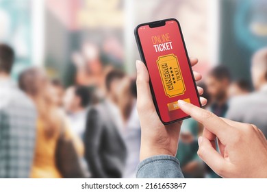 Woman Holding A Smartphone And Buying Movie Tickets Online Using A Mobile App, She Is Skipping The Queue