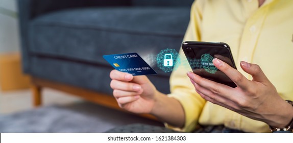 Woman Holding Smartphone And Credit Card With Scanning Biometric Fingerprint For Approval To Access For Payment Mobile Banking On Application Wallet. 