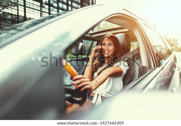 Woman Holding Smartphone Her Hand Talking Stock Photo (Edit Now) 1427666309