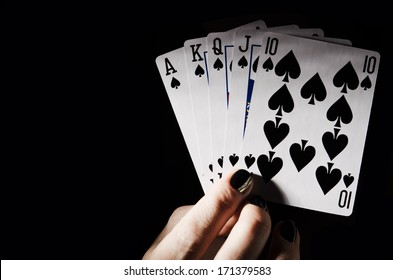 Woman Holding Spades Royal Flush. Poker Game.