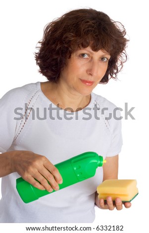 woman holding sponge to clean