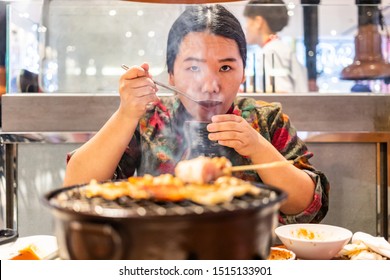 Woman Holding Spoon And Bowl Of Soup, Woman Sipping Soup From Spoon