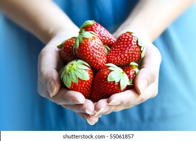 Woman Holding Strawberries