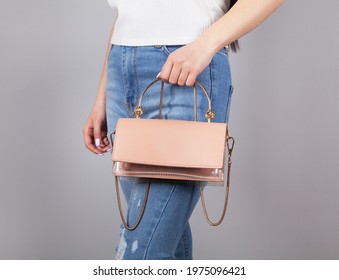  Woman Holding Stylish Female Handbag.