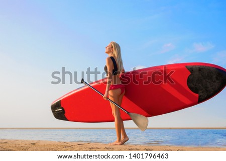 Similar – Image, Stock Photo Surfer woman Beach Ocean