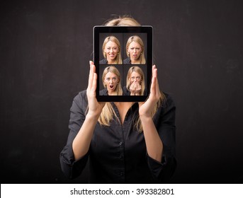 Woman holding tablet with different faces in front of her - Powered by Shutterstock