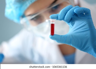 Woman Holding Test Tube With Blood Sample, Closeup