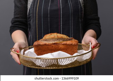 Woman Holding Tray With Tasty Banana Bread, Closeup