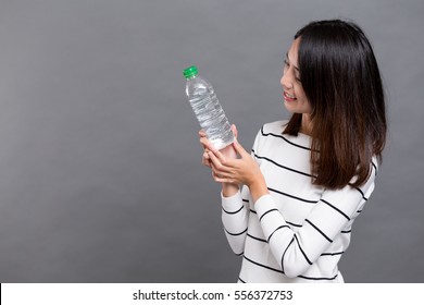 Woman Holding Water Bottle