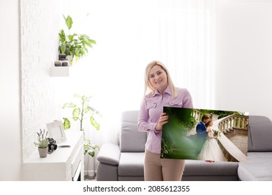 Woman Holding Wedding Photography Photo Canvas Print With Gallery Wrap.