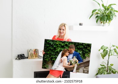 Woman Holding Wedding Photography Photo Canvas Print With Gallery Wrap.