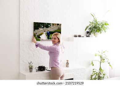 Woman Holding Wedding Photography Photo Canvas Print With Gallery Wrap.