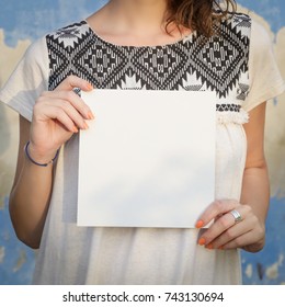 Woman Holding White Blank Paper