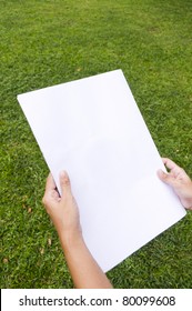 Woman Holding A White Flyer Page, Reading Pose.