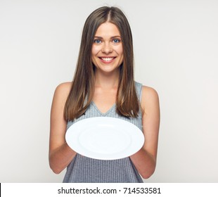 Woman Holding White Plate. Smiling Girl Waitress Isolated.